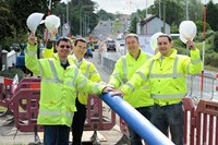 Mark Sefton NI Water, Sean McGlinchey Lagan Construction, Paul Bryce NI Water and Peter Kelly of Lagan Construction helping to lay the final pipe on the project | NI Water News